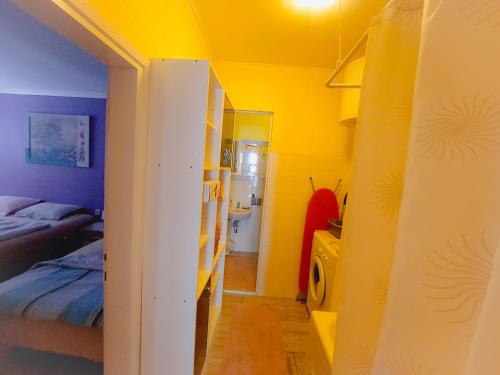 Ένα ή περισσότερα κρεβάτια σε δωμάτιο στο Apartma Tara