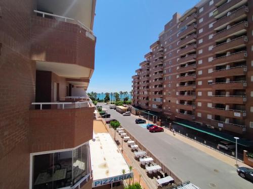 an aerial view of a city street with tall buildings at ACV - Vistamar II-1ª linea planta 3 sur in Oropesa del Mar