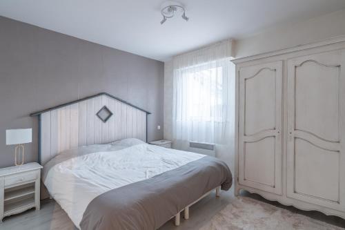 Posteľ alebo postele v izbe v ubytovaní Agréable appartement et terrasse à 2 pas de la mer