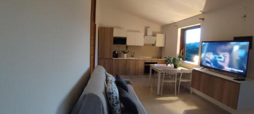 A television and/or entertainment centre at San Teodoro - Salina Bamba