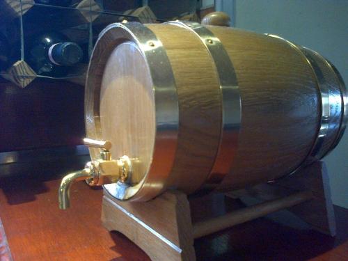 a large wooden drum on a stand with a camera at Aurora Hotel & Italian Restaurant in Nairn
