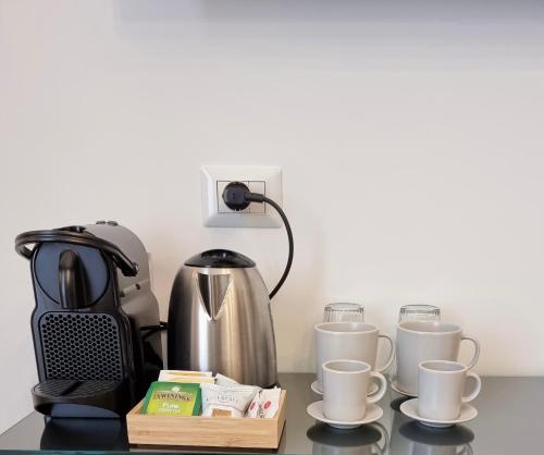 Utensilios para hacer té y café en Dimora Giusti