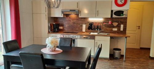 Dapur atau dapur kecil di Ferienwohnung Wikingerland