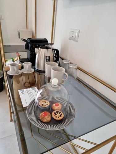 Utensilios para hacer té y café en Dimora Giusti