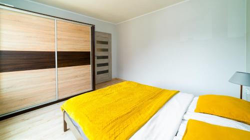 Katil atau katil-katil dalam bilik di Apartament "Nad Jedlicą"