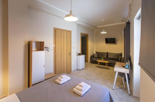 Postel nebo postele na pokoji v ubytování Harmony Studios