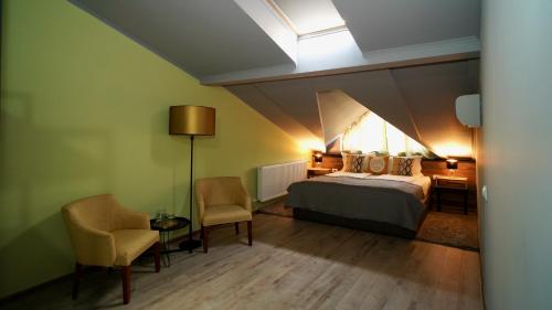 Postel nebo postele na pokoji v ubytování CORVIN HOUSE