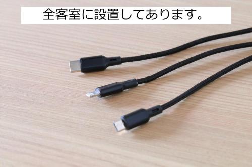 a usb charger cable with two usb ports at Henn na Hotel Kanazawa Korimbo in Kanazawa