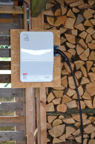 a laptop computer sitting on top of a table at Le chalet de pépère in Stavelot