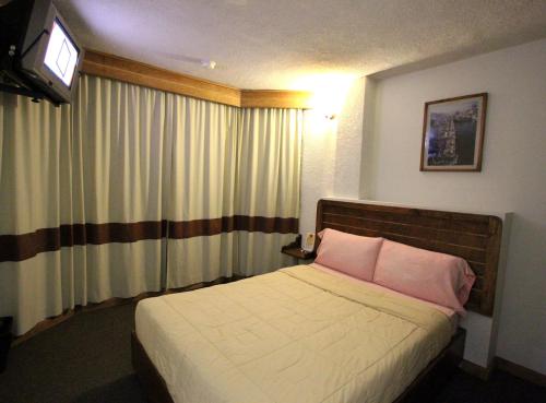 Voodi või voodid majutusasutuse HB Express Hotel toas
