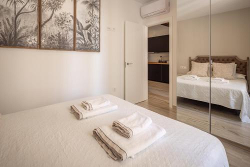 Posteľ alebo postele v izbe v ubytovaní Apartamento Entrecatedrales