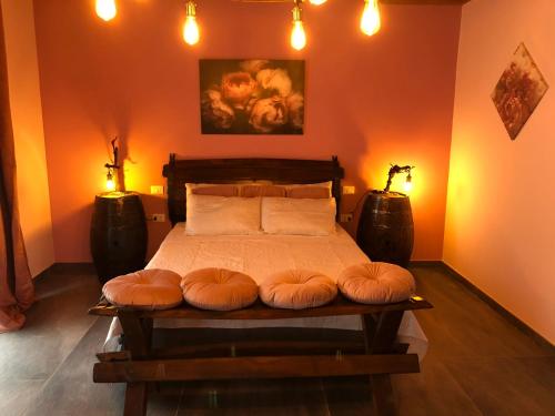 En eller flere senge i et værelse på Il Vecchio Comune B&B
