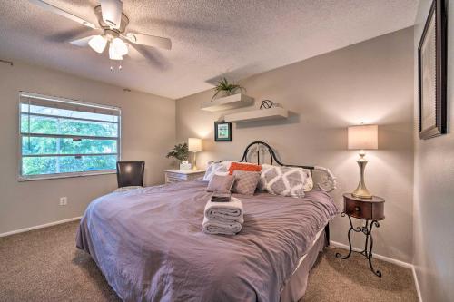 a bedroom with a bed and a ceiling fan at Apopka Family Home Near Downtown 30 Mi to Disney! in Orlando