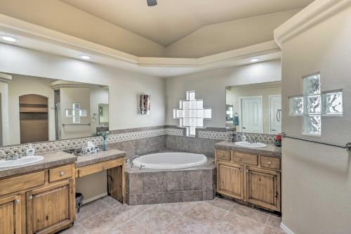 a large bathroom with two sinks and a tub at Lake Havasu Getaway about 2 Mi to London Bridge! in Lake Havasu City