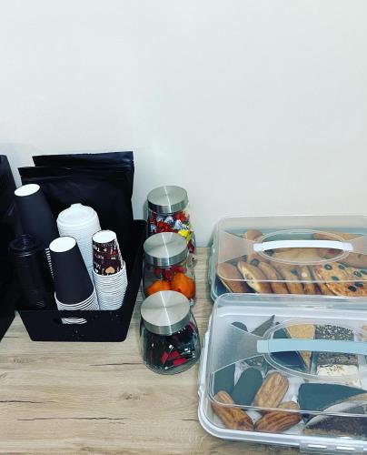 a table with a lunch box and a tray of food at ArevaHostel&Apartment in Yerevan