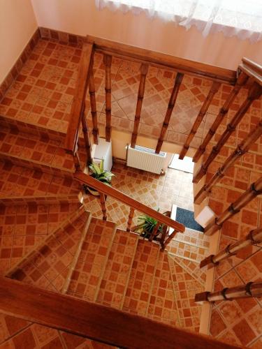 an overhead view of a staircase in a house at Fodor Vendégház in Racu