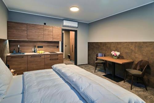 Ένα ή περισσότερα κρεβάτια σε δωμάτιο στο ABA Apartments