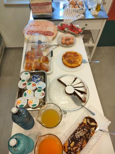 a table with many different types of food on it at Maison Nanà in Sorrento