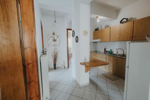 Kuchyň nebo kuchyňský kout v ubytování House of Gardenia