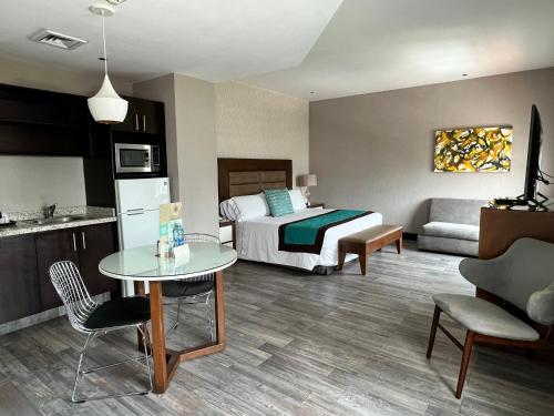Η κουζίνα ή μικρή κουζίνα στο Áurea Hotel and Suites