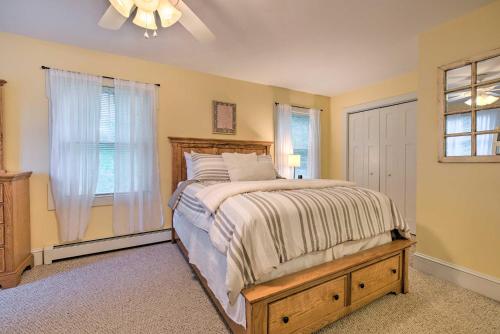 a bedroom with a bed and a window at Large Yard and Games Edgewater Escape in Paupack! in Paupack