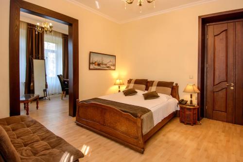 Postel nebo postele na pokoji v ubytování Hotel British House