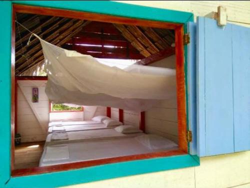 Una cama o camas en una habitación de Hostal Doble Vista