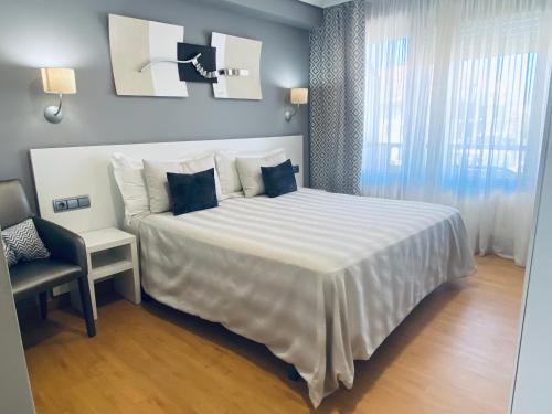 Hotel Las Olasにあるベッド