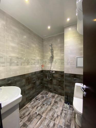 Koupelna v ubytování Bright apartment for 5 guests with free parking