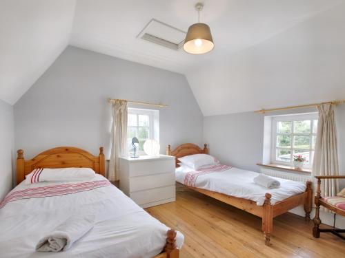 מיטה או מיטות בחדר ב-Ingleside