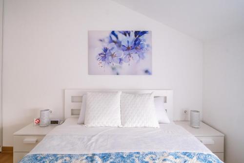 Postel nebo postele na pokoji v ubytování Mikonos apartman