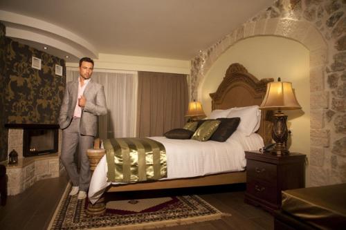 Archontopetra Boutique Hotelにあるベッド