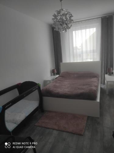 Katil atau katil-katil dalam bilik di Apartament Pudrowy