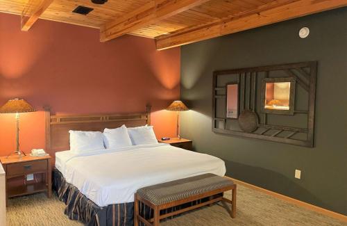 Ein Bett oder Betten in einem Zimmer der Unterkunft Best Western Starlite Village