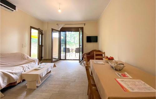 A bed or beds in a room at Nice Apartment In Nafpaktos With Wifi