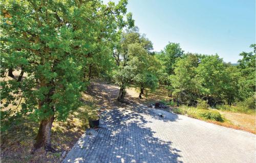 an overhead view of a road with trees at 4 Bedroom Gorgeous Home In Chamaret in Chamaret