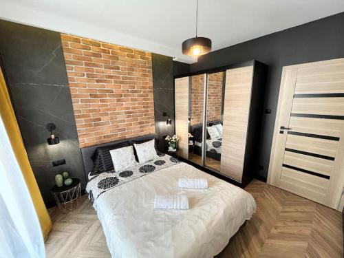 Posteľ alebo postele v izbe v ubytovaní Turzycowa Loft - stylish apartment