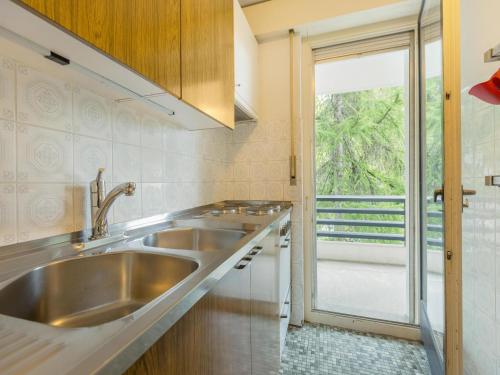 Η κουζίνα ή μικρή κουζίνα στο Apartment Crans-Montana near Ski Slopes