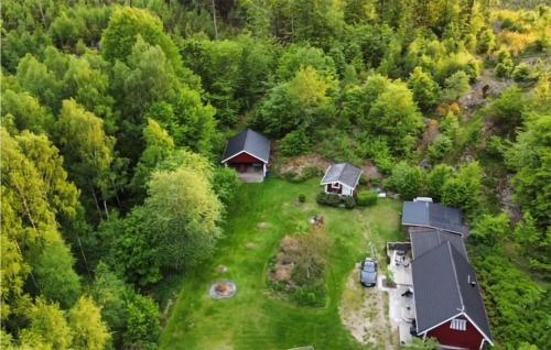 an aerial view of a house in the middle of a forest at Amazing Home In Johannishus in Johannishus