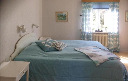 Кровать или кровати в номере 1 Bedroom Beautiful Home In Lidkping