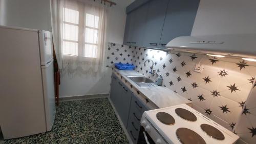 Kuchyň nebo kuchyňský kout v ubytování ANNAS HOUSE