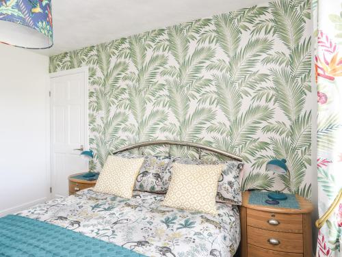 Posteľ alebo postele v izbe v ubytovaní Trewan Cottage