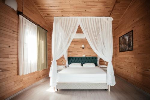 Katil atau katil-katil dalam bilik di Serenity Bungalows