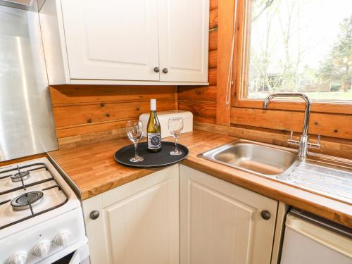 Kuchyň nebo kuchyňský kout v ubytování Alwinton Lodge