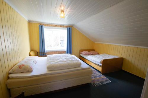 Postel nebo postele na pokoji v ubytování Hegna Camping