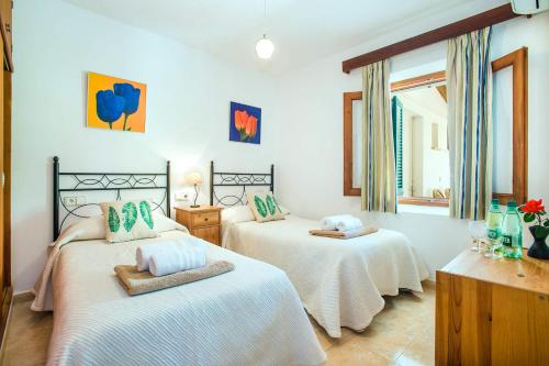 Postel nebo postele na pokoji v ubytování Villa Lorenzo by Villa Plus