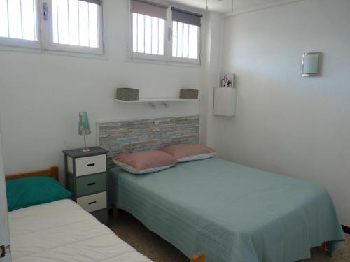 Posteľ alebo postele v izbe v ubytovaní Sol-y-Days Hespérides, Appartement familial 5 couchages, quartier calme à 50m de la plage