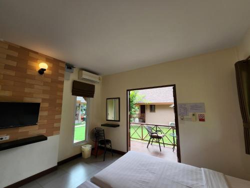 Postel nebo postele na pokoji v ubytování La-or Resort