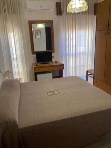 Letto o letti in una camera di Hotel L'Ancora