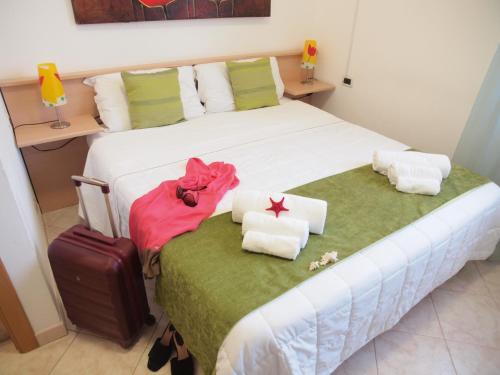 Ένα ή περισσότερα κρεβάτια σε δωμάτιο στο Locanda Basement Rooms